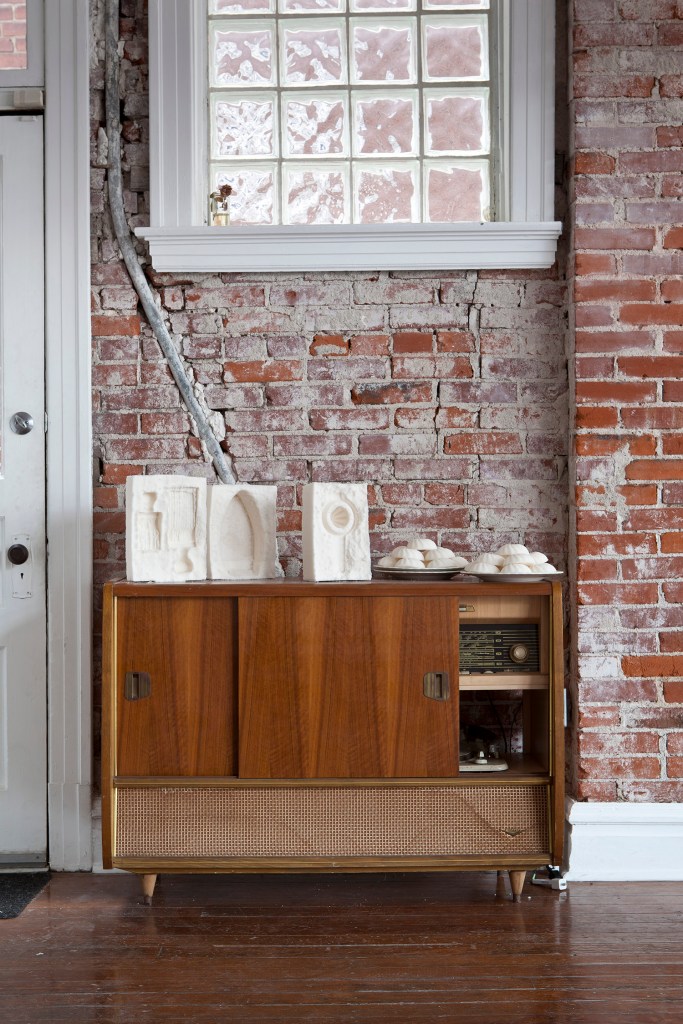 Cleavemark Dr., cabinet style installation: salvaged hi-fi + cast sugar cakes + “sugar cubes,” cast sugar blocks w/ object impressions (stamps, iron, juicer). Stephanie Ellis Schlaifer & Cheryl Wassenaar, Fort Gondo Compound for the Arts, fall 2014